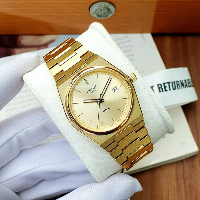 Tissot PRX 35mm Champagne Dial Gold-tone Unisex Watch- T137.210.33.021.00